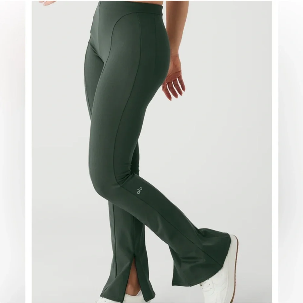 Alo‎ Yoga High-Waist Zip it Flare Legging in Dark Cactus Green.